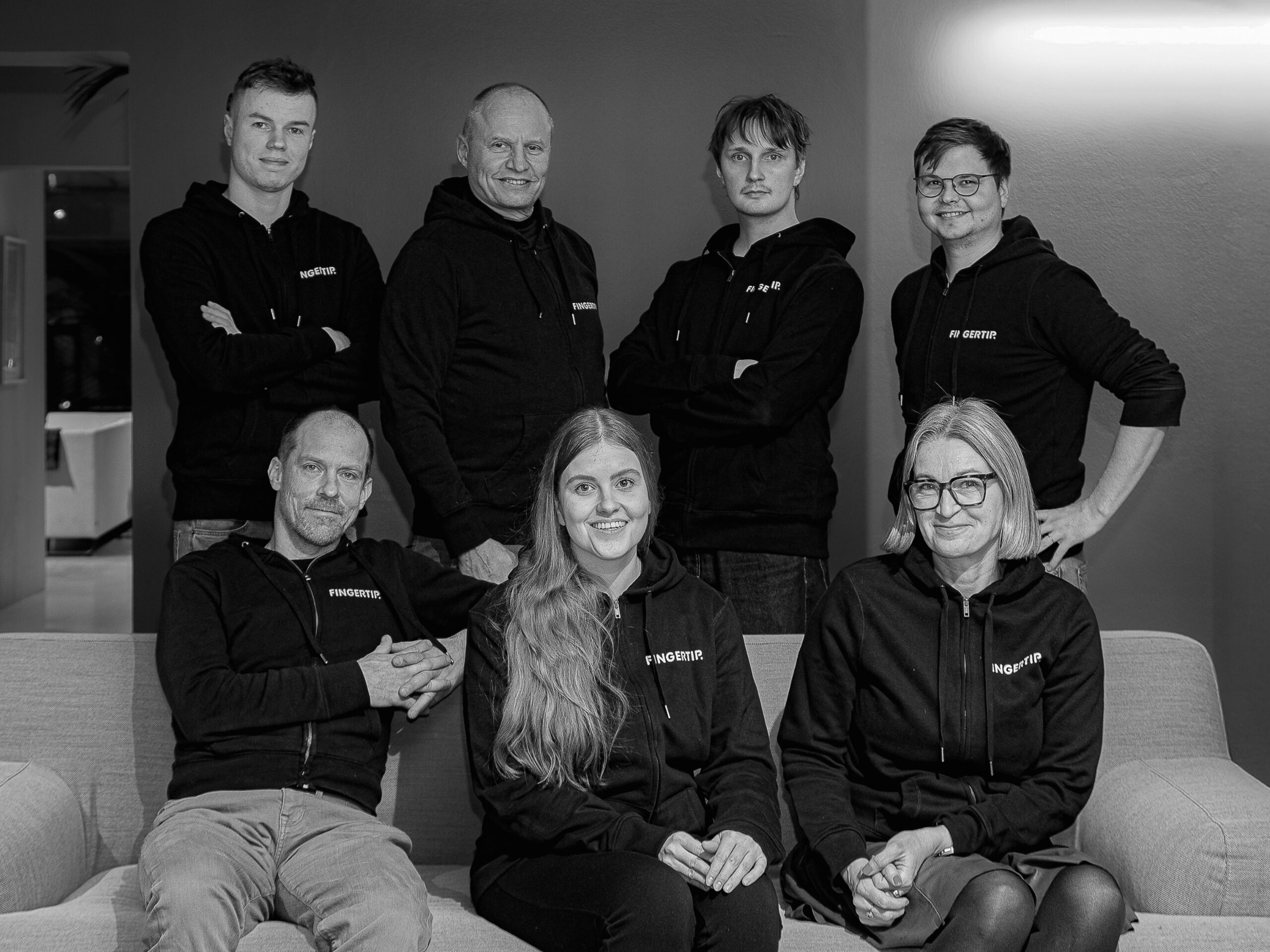 Black and white photo of the Fingertip team taken in January 2026